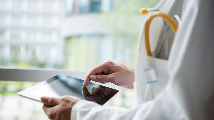 Man holding a tablet